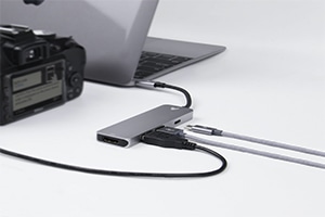 Computer with multiple cables attached